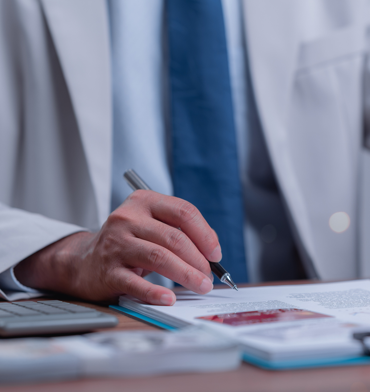 Physician reviewing medical documents